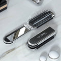 Mini Folding Hair Brush - מברשת שיער מתקפלת עם מראה